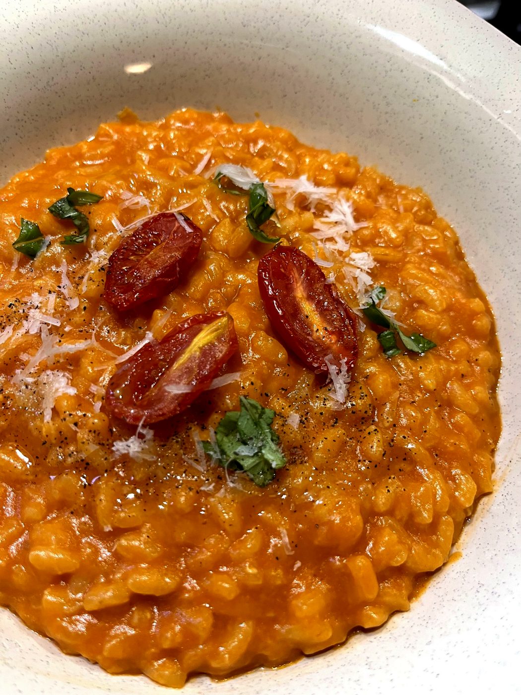 Tomato risotto with confit cherry tomatoes and basil