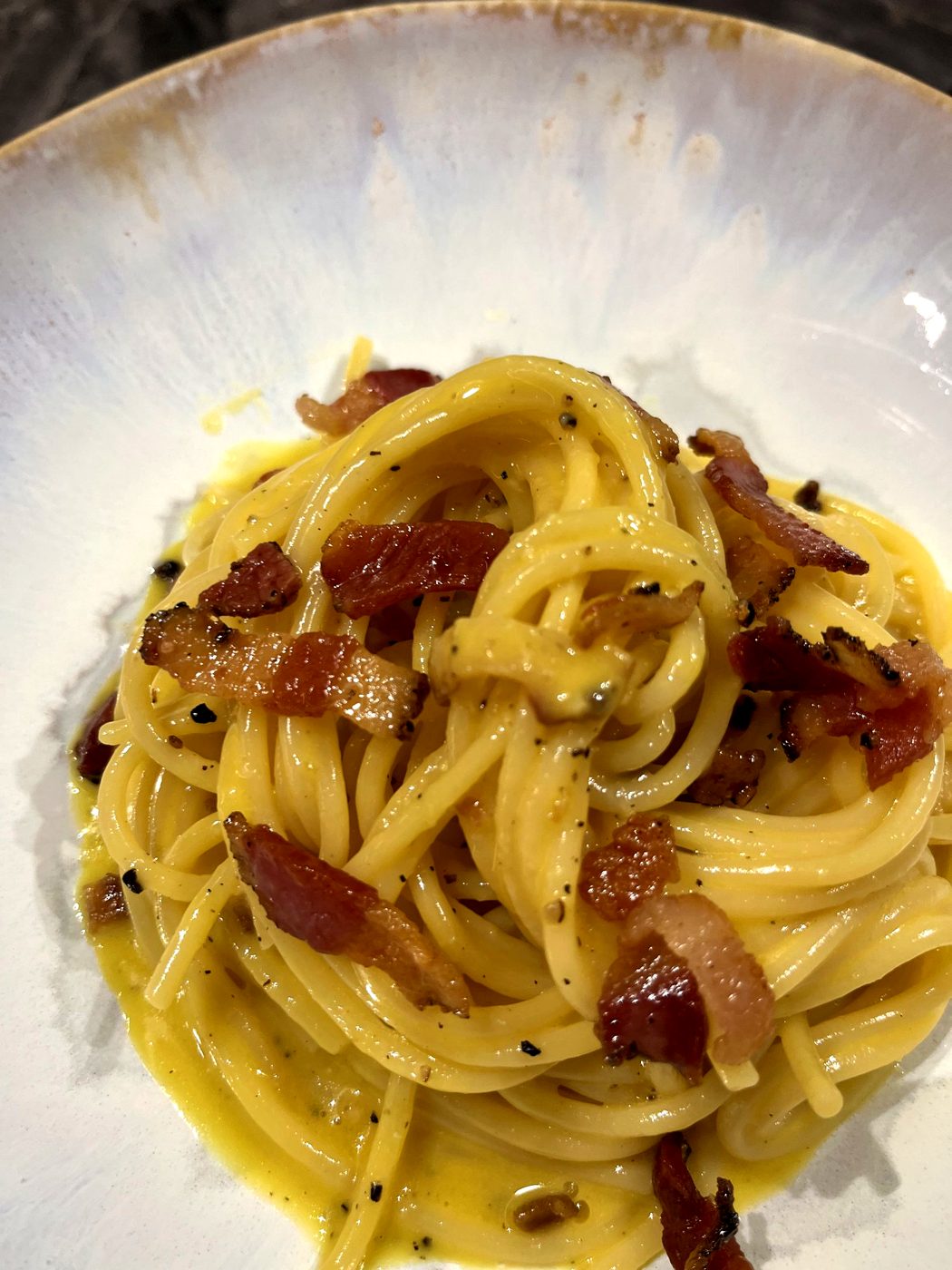Spaghetti carbonara with crisp guanciale