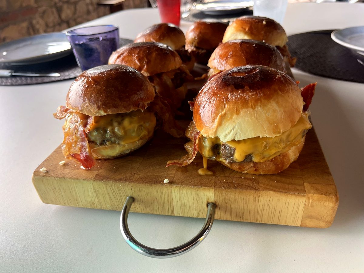 Mini burgers on a wooden board